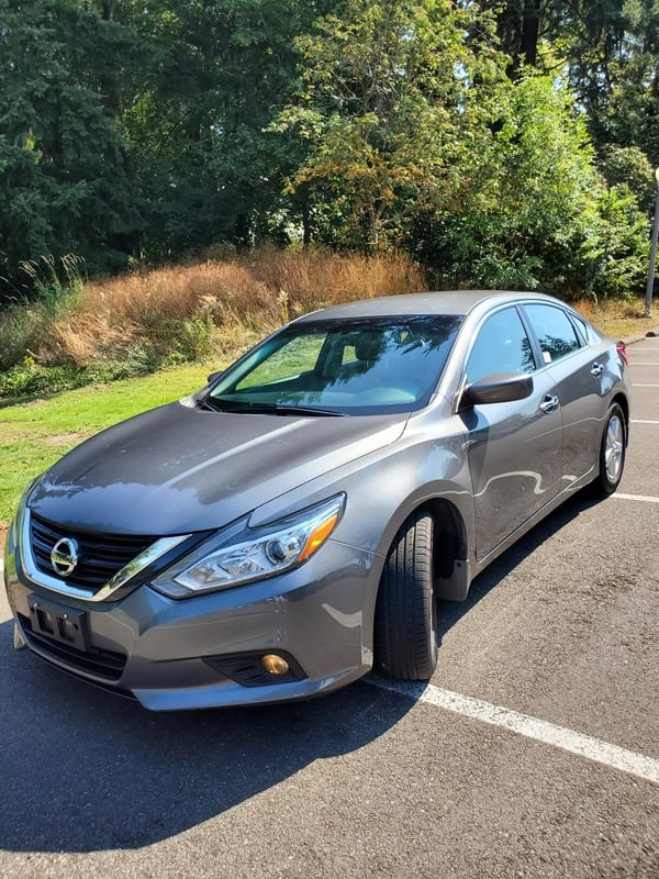 2018 Nissan Altima, gray sedan, front three-quarter view