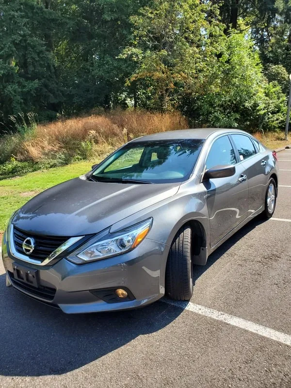 2018 Nissan Altima, gray sedan, front three-quarter view