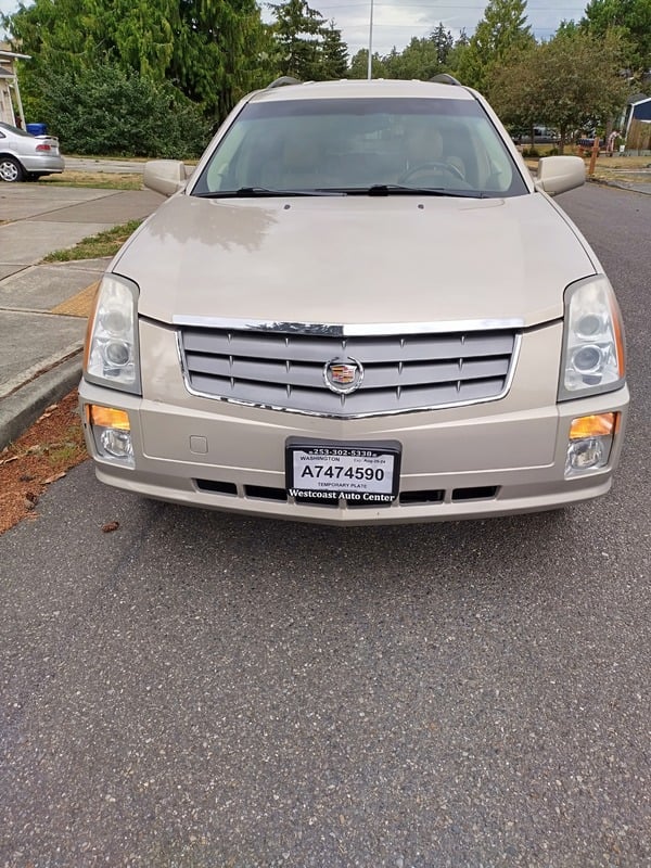 2008 Cadillac SRX, gold SUV, front view